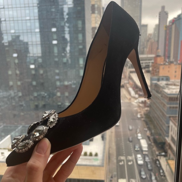 Italian high heel shoes with diamond embellishments.